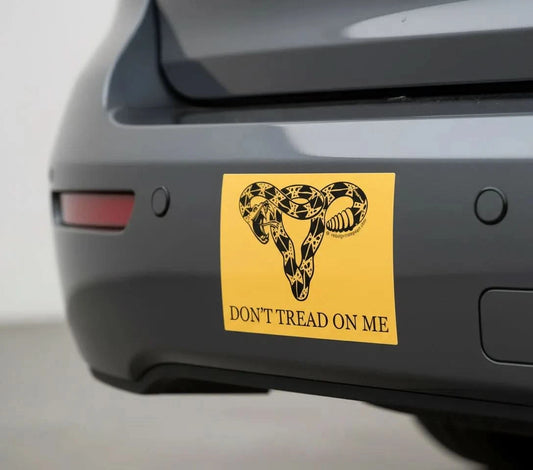 Don’t Tread on me gadsden uterus bumpersticker on a car bumper, Pro choice feminist art for reproductive rights and women’s rights, Anne Lesniak, Rebel Girl Rampage