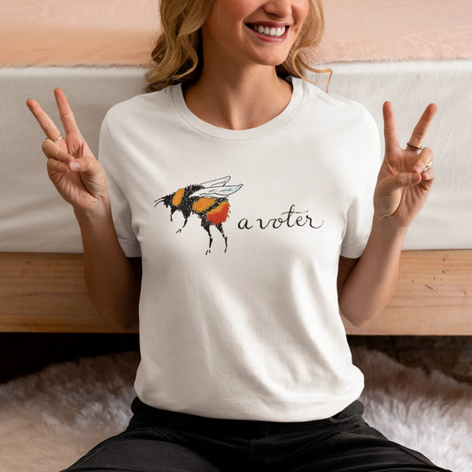 Bee a Voter Unisex T-Shirt, Graphic of a hand drawn bumble bee with the words a voter behind it on a white tee, Nicole Bizzarro, Rebel Girl Rampage