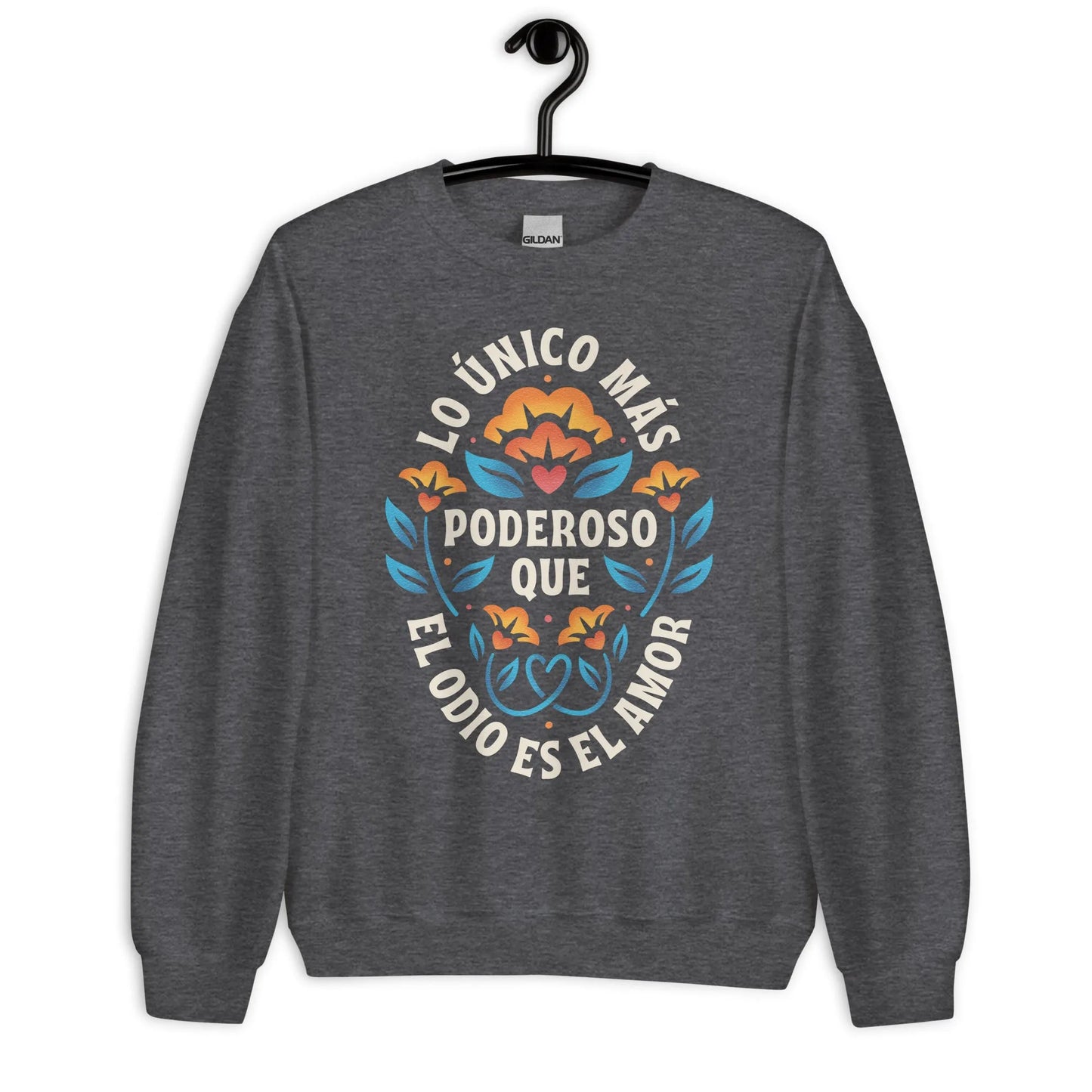 Grey unisex crewneck sweatshirt with a flower graphic and words that say, "Lo unicorn has poderoso que el odio es el amor." Love is more powerful than hate, bad bunny quote, super bowl halftime show 2026, Rebel Girl Rampage