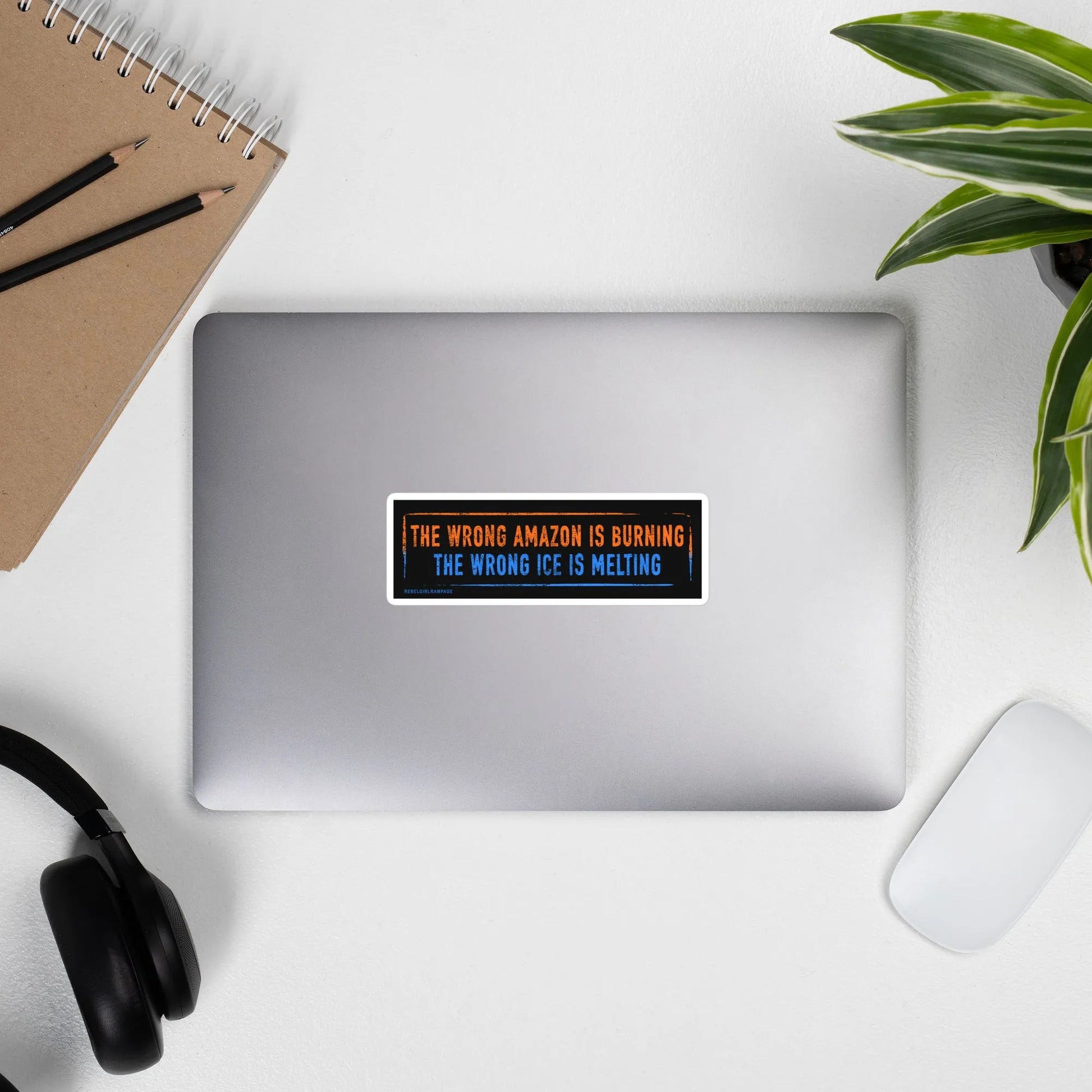 Orange and blue "The Wrong Amazon is Burning, The Wrong Ice is Melting" sticker, anti-amazon, anti-ICE, protest stickers, humanitarian, Rebel Girl Rampage
