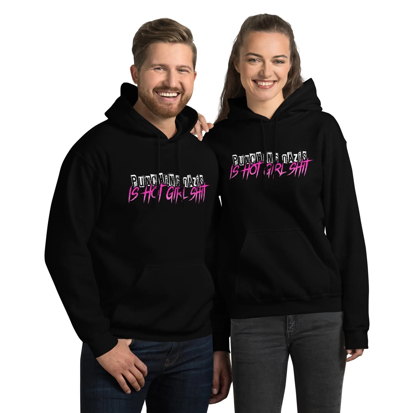 Hot girl Ish unisex hoodie, a smiling couple wearing black hoodie swith an 80s style graphic saying “punching Nazis is hot girl shit” Feminist antifa art, Rebel Girl Rampage