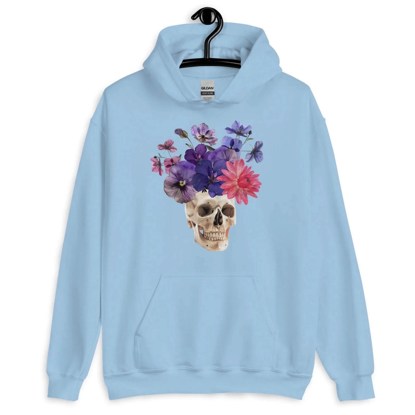 Skull graphic with beautiful pink and purple flowers on a light blue hoodie, macabre, beautiful, nature, witchy, floral, spooky season, Rebel Girl Rampage