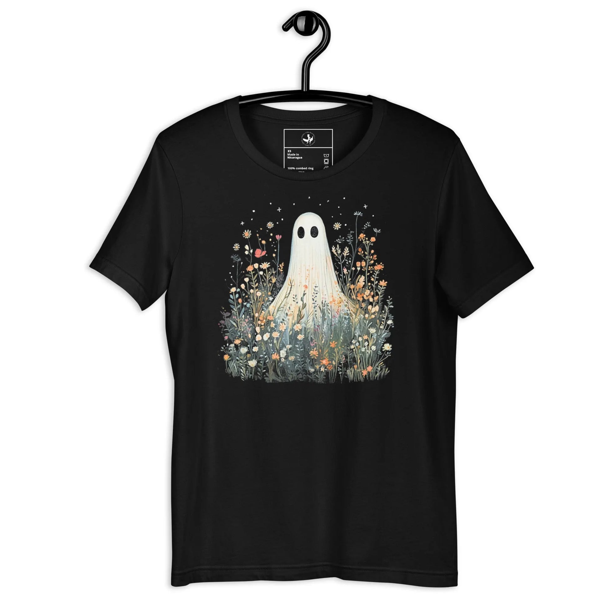Cute ghost graphic in a field of flowers and foliage on a black unisex t shirt, spooky season, cute, Rebel Girl Rampage