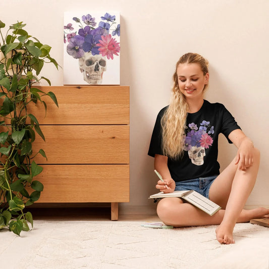 Skull graphic with beautiful pink and purple flowers on a black unisex t shirt, macabre, beautiful, nature, witchy, floral, spooky season, Rebel Girl Rampage