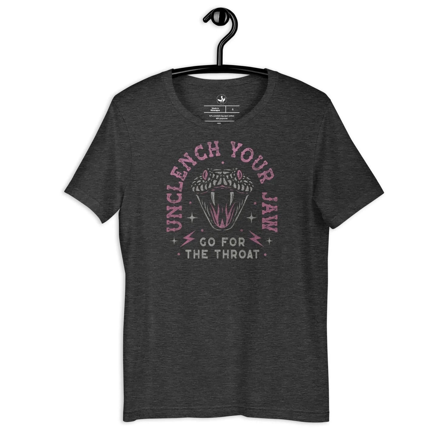 Pink and white snake graphic with the words, "Unclench Your Jaw Go For the Throat" on a dark grey heather unisex t shirt, make a statement and be empowered to take on the powers that be, Rebel Girl Rampage
