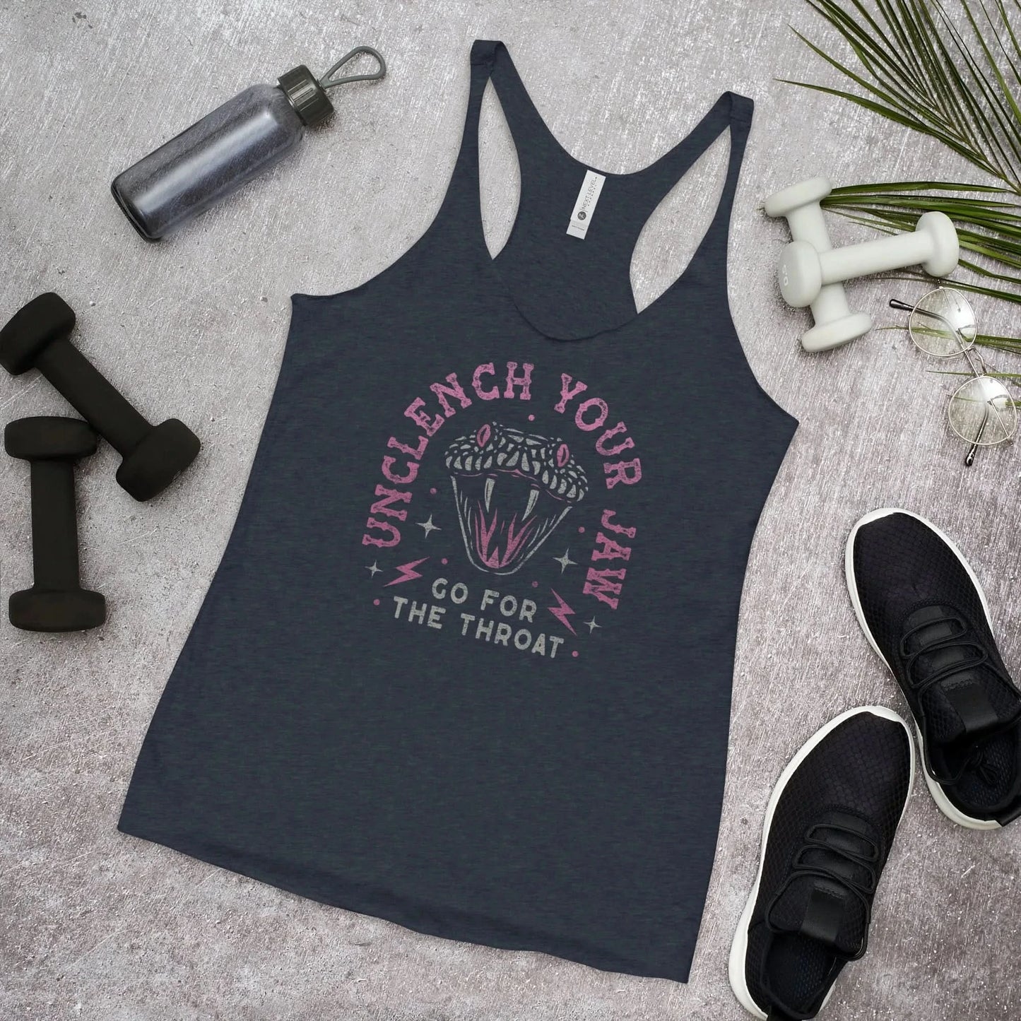 Pink and white snake graphic with the words, "Unclench Your Jaw Go For the Throat" on a vintage navy racerback tank, make a statement and be empowered to take on the patriarchy and the powers that be, Rebel Girl Rampage
