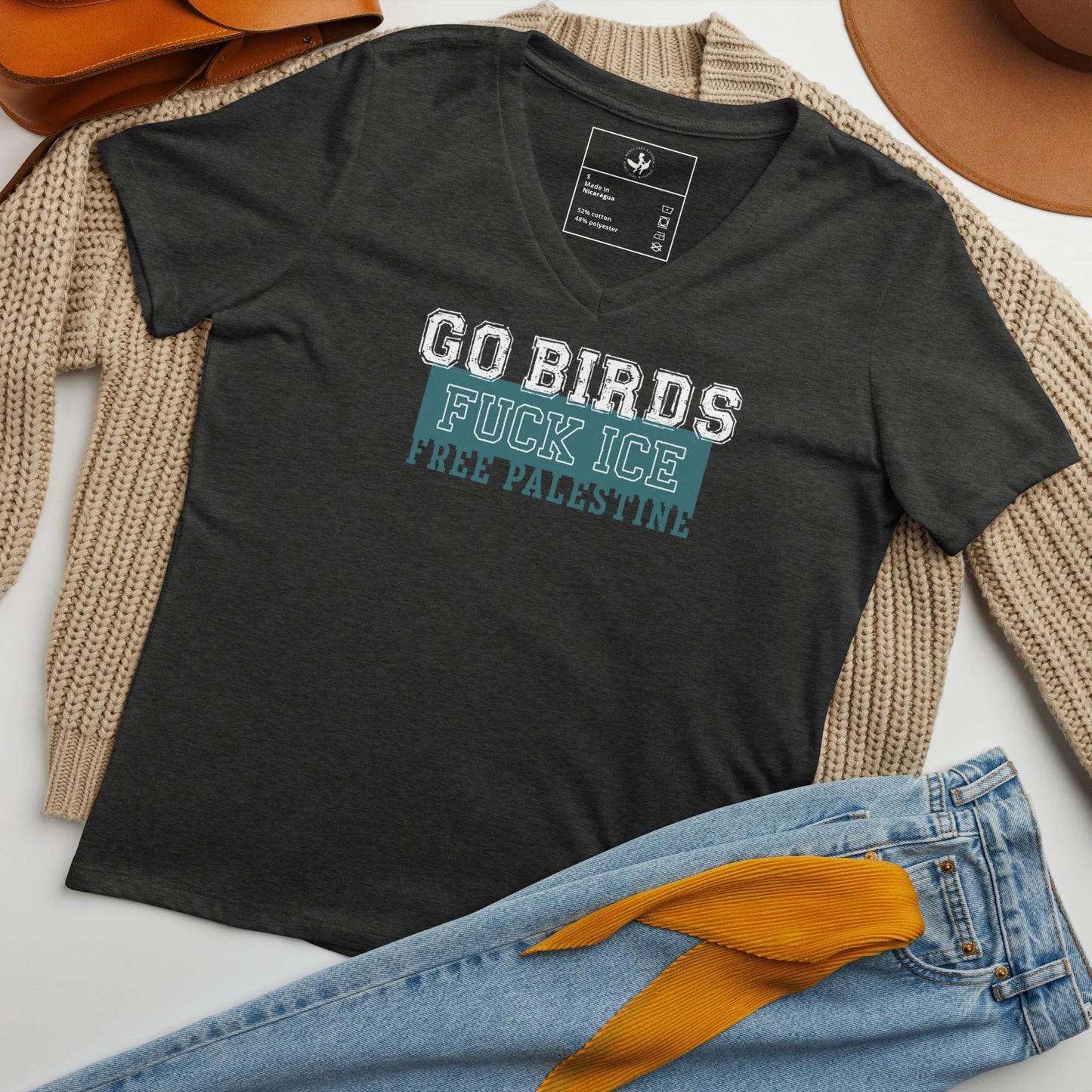 Go Birds, F ICE, Free Palestine sports letters graphic on a dark grey v-neck t shirt, sports, birds, anti-ICE, equality, protest shirts, Rebel Girl Rampage