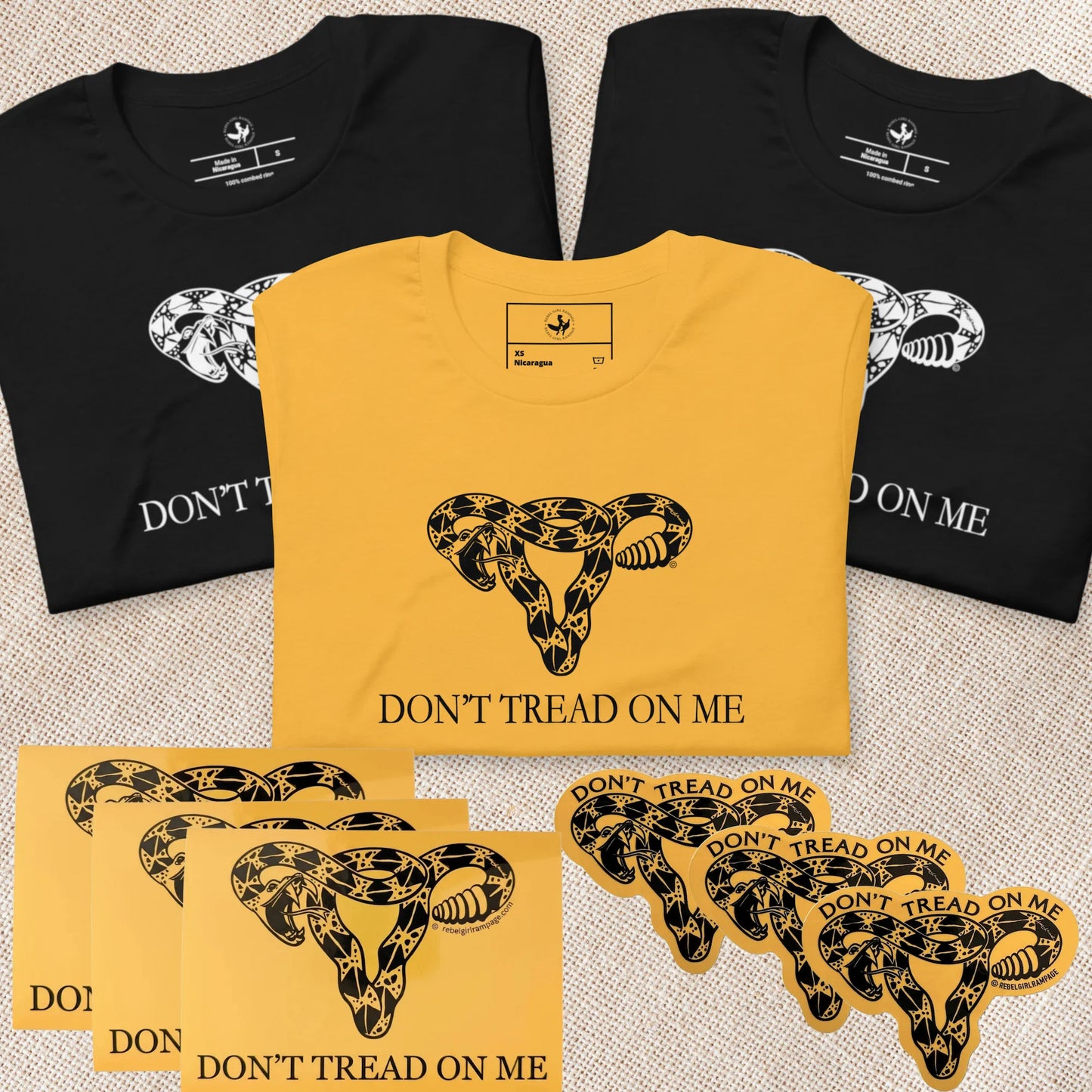Don’t Tread On Me Uterus Feminist Sisterhood holiday Gift Bundle, Gadsen Rattlesnake uterus T-shirts bumper stickers and die cut stickers, Anne Lesniak, Rebel Girl Rampage 