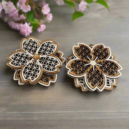 Sakura Cherry Blossom Handcrafted Wood and Acrylic Boho Coaster Set on a table with flowers as home decor at Rebel Girl Rampage 