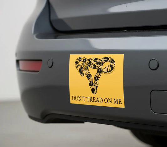 Don’t Tread on me gadsden uterus bumpersticker on a car bumper, Pro choice feminist art for reproductive rights and women’s rights, Anne Lesniak, Rebel Girl Rampage