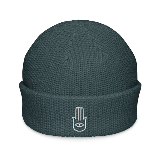 A petrol Green wide knit winter fisherman beanie embroidered with a Hamsa or Evil Eye Protection symbol  from Rebel Girl Rampage 