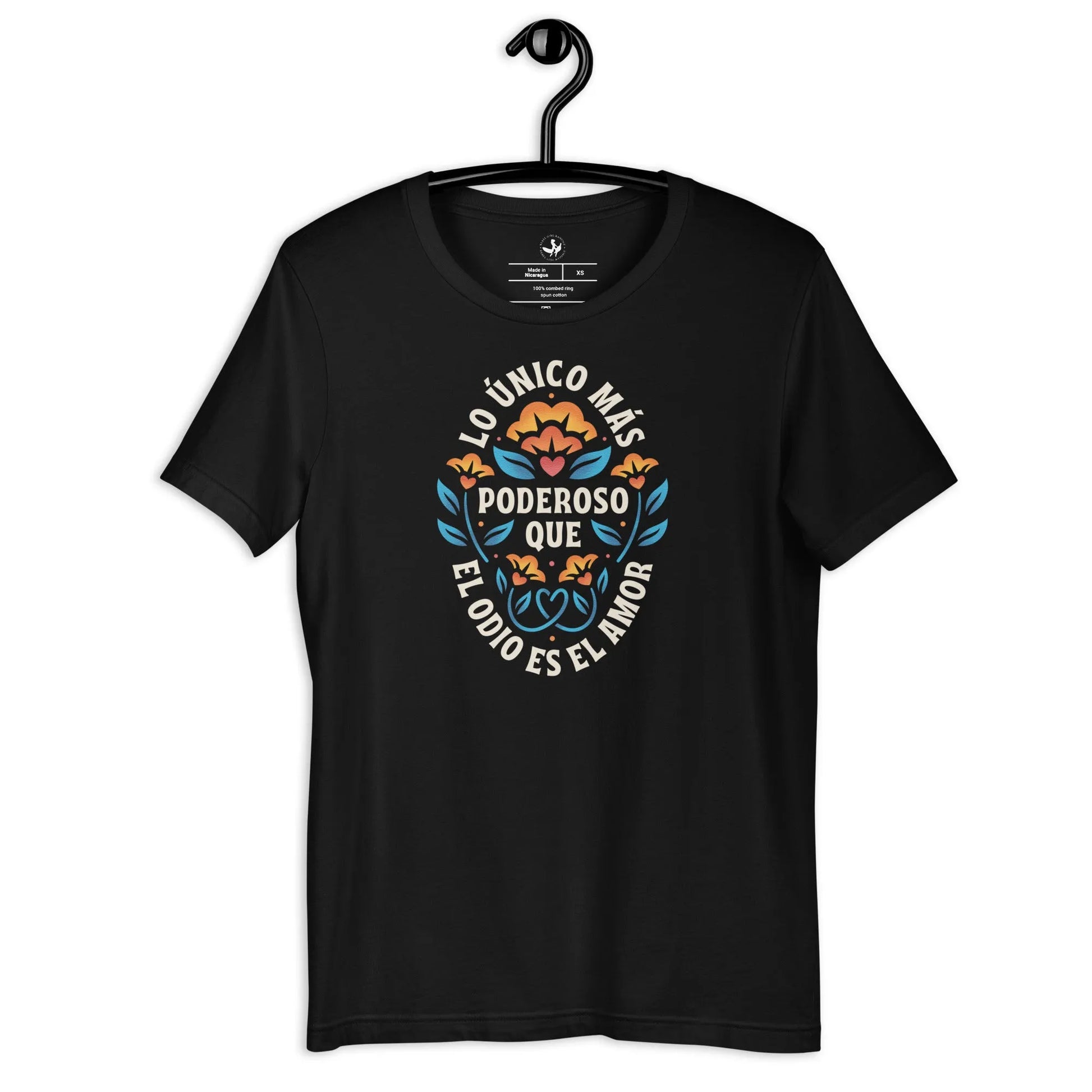 Black Unisex T Shirt with floral graphic and words that say, "Lo unico mas poderoso que el odio es el amor." Love is more powerful than hate bad bunny Spanish quote Super Bowl halftime show, Rebel Girl Rampage