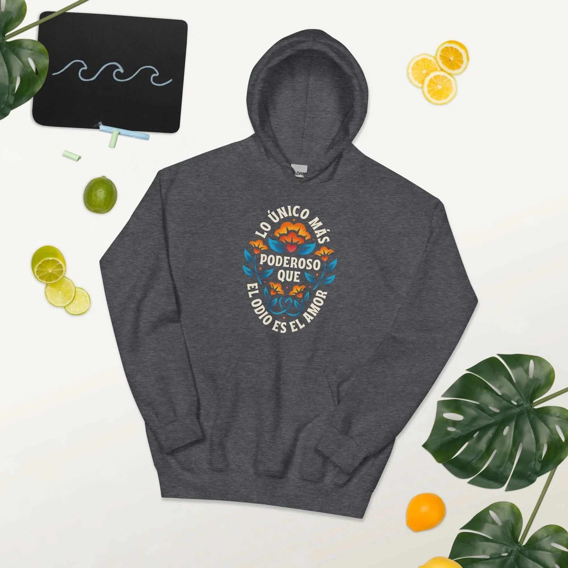 Grey unisex hoodie with a pretty flower graphic that says "Lo Unico has ponderosa que el odio es el amor." Love is more powerful than hate Bad Bunny Quote Super Bowl 2026, rebellion, love, Rebel Girl Rampage.