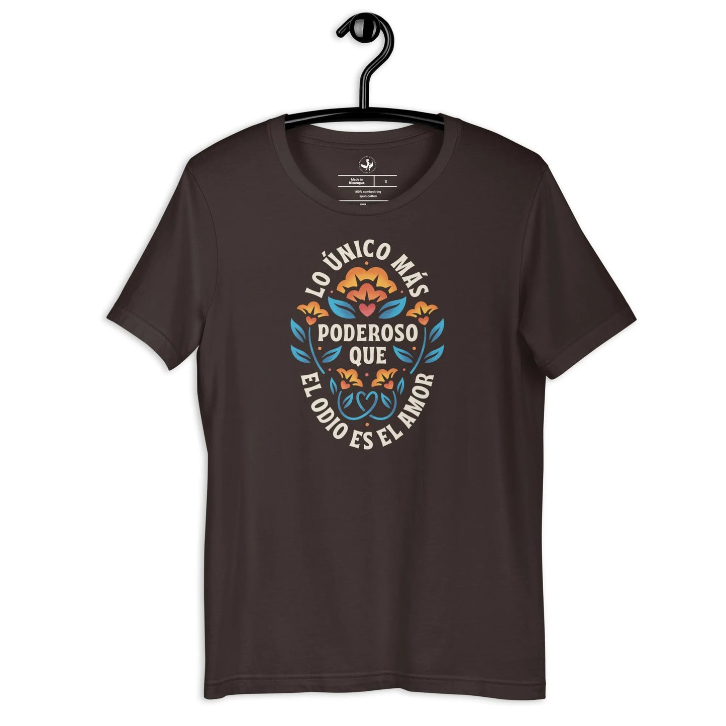 Brown Unisex T Shirt with floral graphic and words that say, "Lo unico mas poderoso que el odio es el amor." Love is more powerful than hate bad bunny Spanish quote Super Bowl halftime show, Rebel Girl Rampage