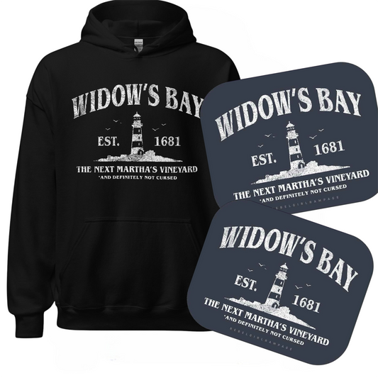 A black pullover hoodie with a white 'Widow's Bay' lighthouse graphic, shown alongside two matching dark blue stickers  featuring the same design. The text reads 'Widow's Bay', ‘Est. 1681