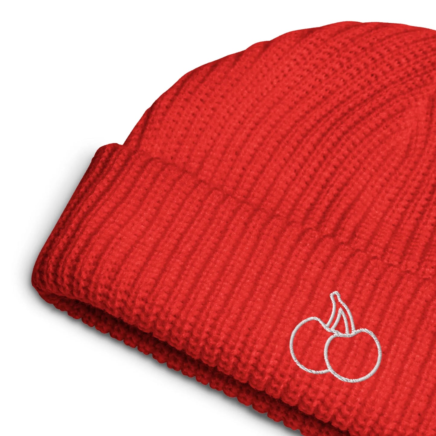 Cherries embroidered on a bright red cozy beanie perfect for colder weather, Rebel Girl Rampage