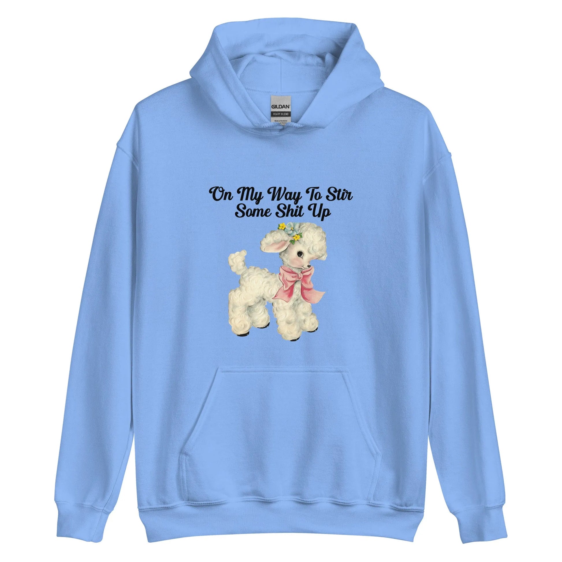 Blue hoodie with a cute cartoon lamb with text that says, "on my way to stir some shit up." Cute & sassy graphic design, Rebel Girl Rampage 