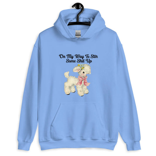 Light blue hoodie with a cute cartoon lamb with text that says, "on my way to stir some shit up." Cute & sassy graphic design, Rebel Girl Rampage 