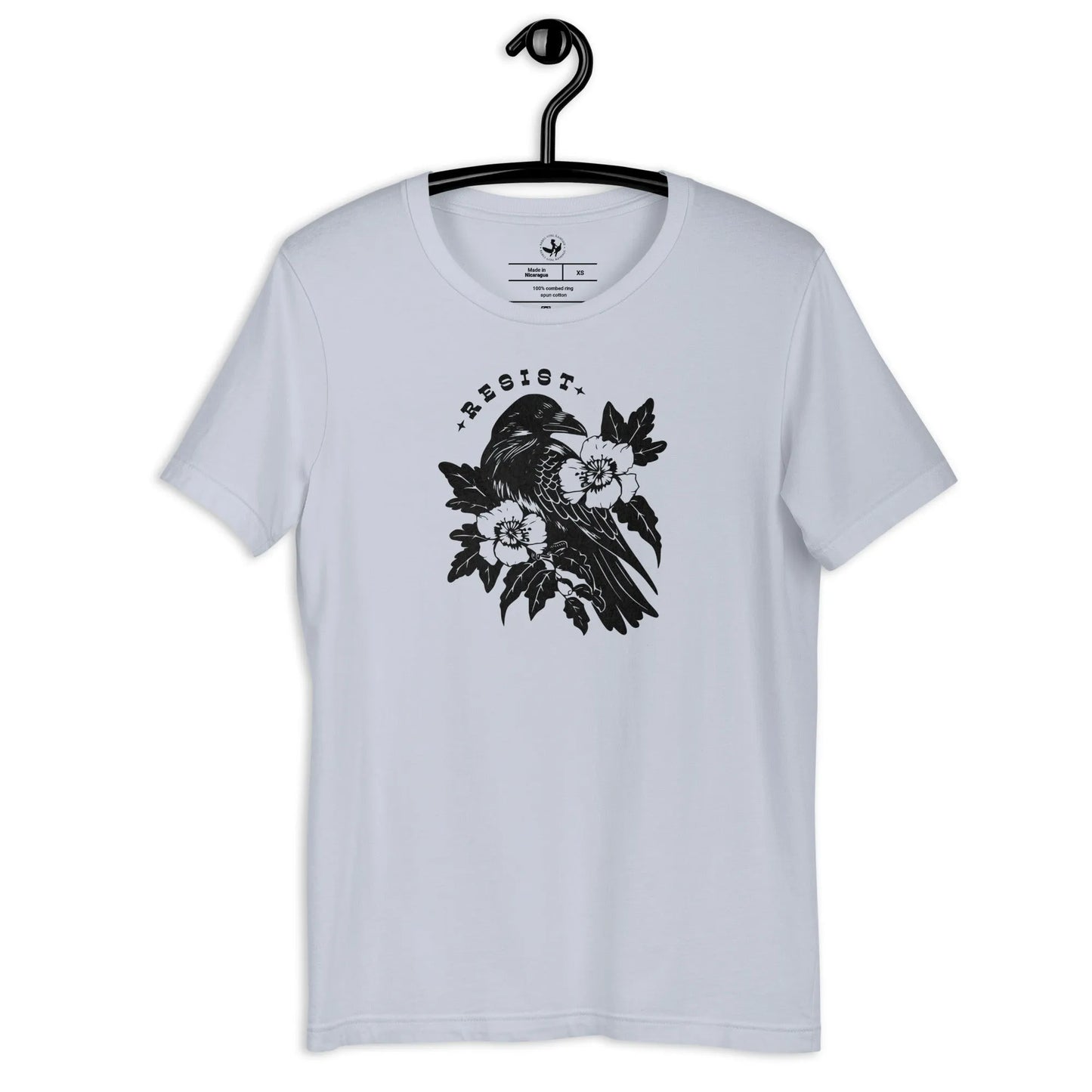 Resist Crow Floral and Leafy Graphic on a light blue unisex t shirt, witchy nature vibes, Rebel Girl Rampage
