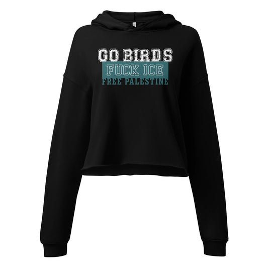 Go Birds, Fuck ICE, Free Palestine white and turquoise graphic on a crop black hoodie, Rebel Girl Rampage, $5 per piece sold is donated to CHOP- Children's Hospital of Philadelphia 