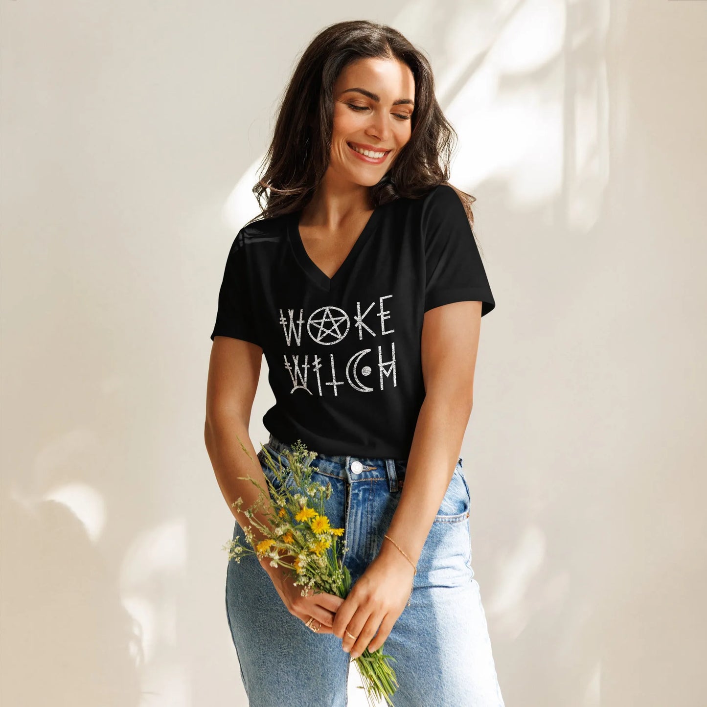 Woke Witch Women’s Tri-blend V-neck T-shirt, Graphic of a pentagram and other witchy symbols on a black t-shirt that says “woke witch”, Halloween, feminist art, Rebel Girl Rampage
